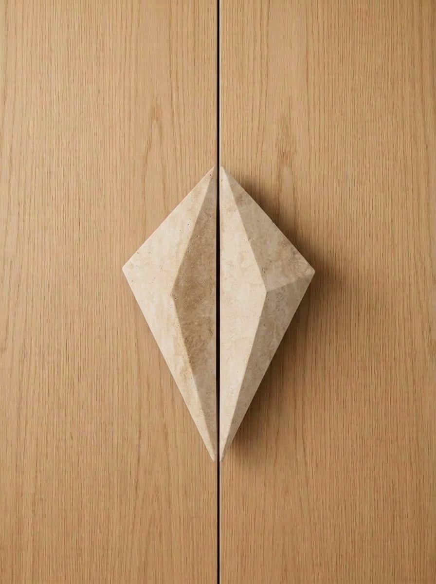 Yukixstone Diamond Stone Pull pair in Classic Travertine installed on closed oak double doors - the two faceted halves meet to form a full diamond