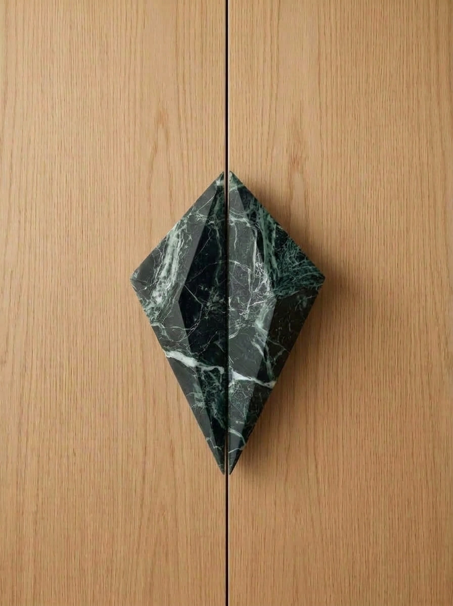 Yukixstone Diamond Stone Pull pair in Verde Alpi installed on closed oak double doors - the two faceted halves meet to form a full diamond