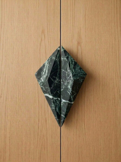 Yukixstone Diamond Stone Pull pair in Verde Alpi installed on closed oak double doors - the two faceted halves meet to form a full diamond