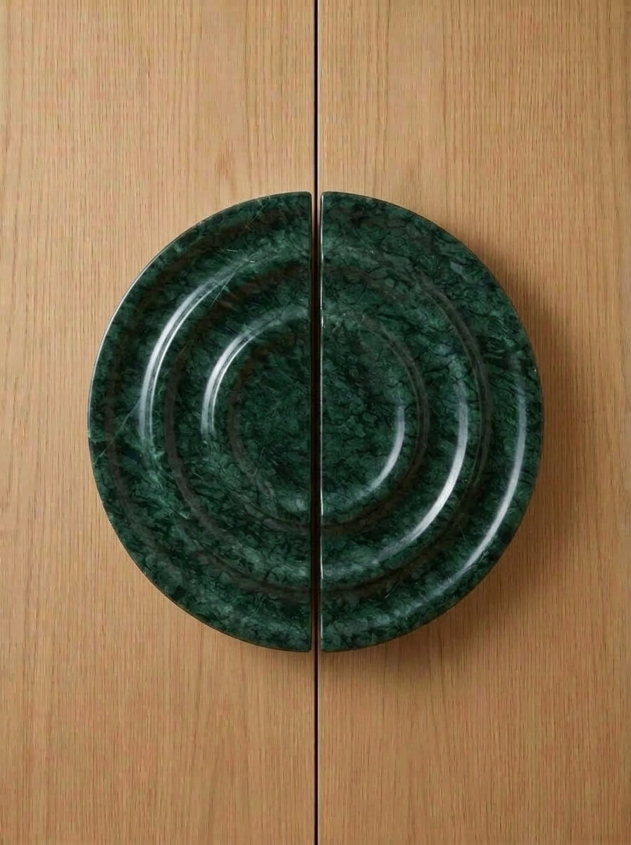 Yukixstone Verde Alpi natural stone disc pull pair - hand-carved round marble door pull with concentric ripple carving, split across a pair of doors