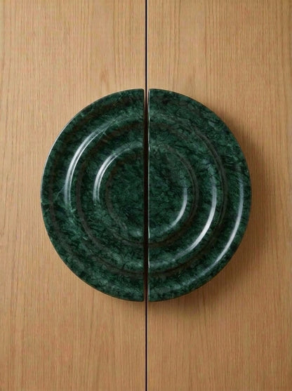 Yukixstone Verde Alpi natural stone disc pull pair - hand-carved round marble door pull with concentric ripple carving, split across a pair of doors