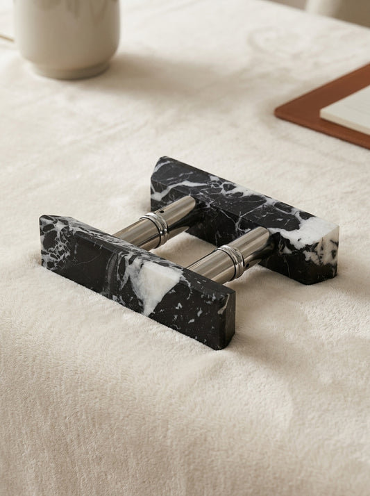 Yukixstone Ingot Stone Door Pull - double-side mount assembly of two chamfered Nero Marquina marble ingots joined by a brushed metal barrel, sold as a pair