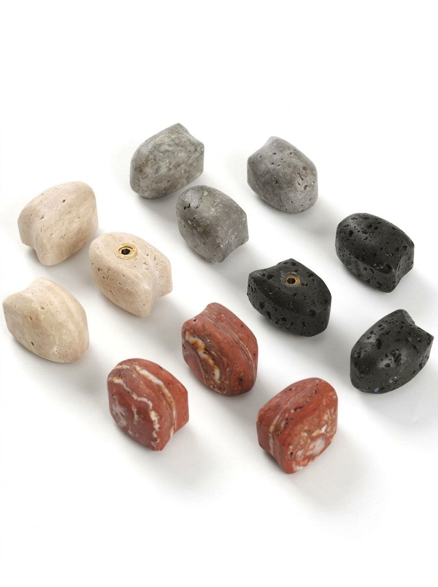 Yukixstone pebble stone knob collection - natural marble, lava stone and travertine cabinet knobs in four colourways