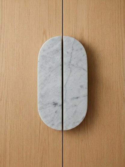 Yukixstone Pill Stone Door Pull - hand-carved oval split pull in Bianco Carrara marble, sold as a pair for wardrobes and double doors