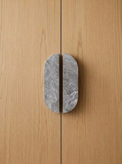 Yukixstone Pill Stone Door Pull - hand-carved oval split pull in Grigio Carnico grey marble, sold as a pair for wardrobes and double doors
