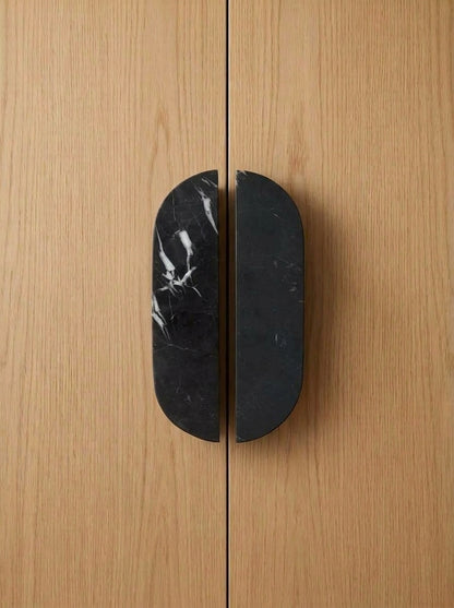 Yukixstone Pill Stone Door Pull - hand-carved oval split pull in Nero Marquina black marble, sold as a pair for wardrobes and double doors