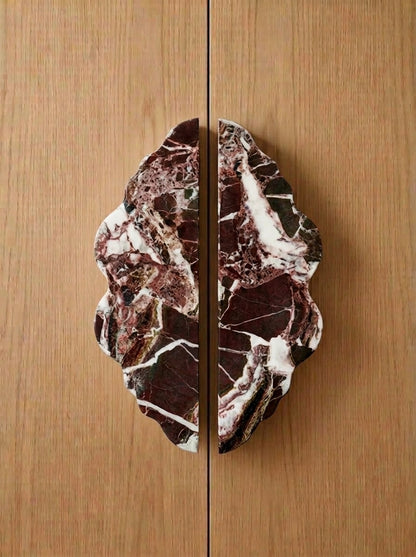 Yukixstone Ridge Stone Door Pull - lobed split pull hand-carved in Rosso Levanto burgundy marble with white veining, mounted on oak double doors