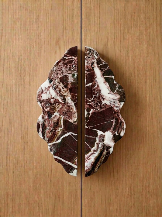 Yukixstone Ridge Stone Door Pull - lobed split pull hand-carved in Rosso Levanto burgundy marble with white veining, mounted on oak double doors