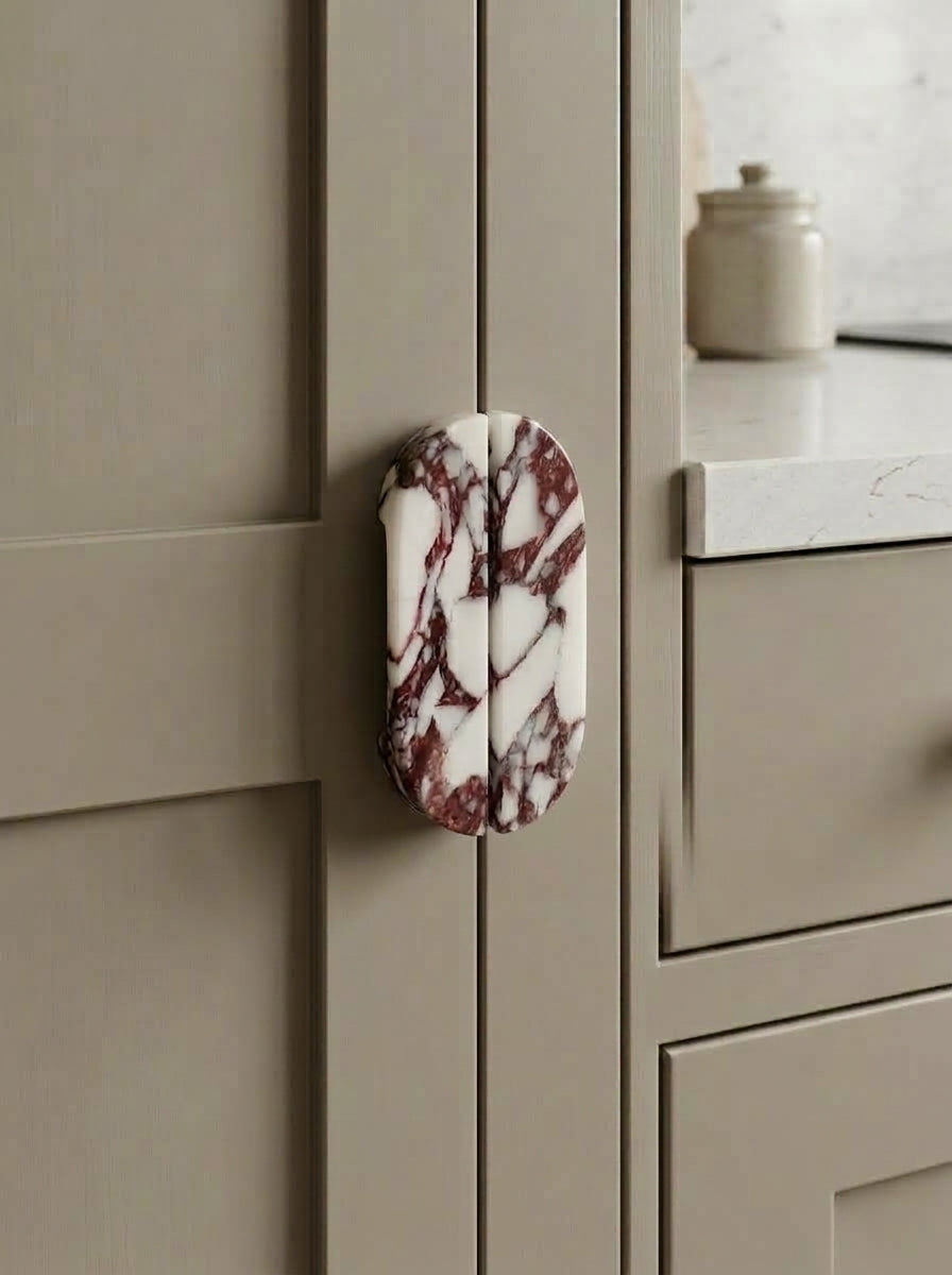 Yukixstone Viola Oval Stone Door Pull - hand-carved oval split pull in Calacatta Viola marble mounted on a grey cabinet, sold as a pair for wardrobes and double doors